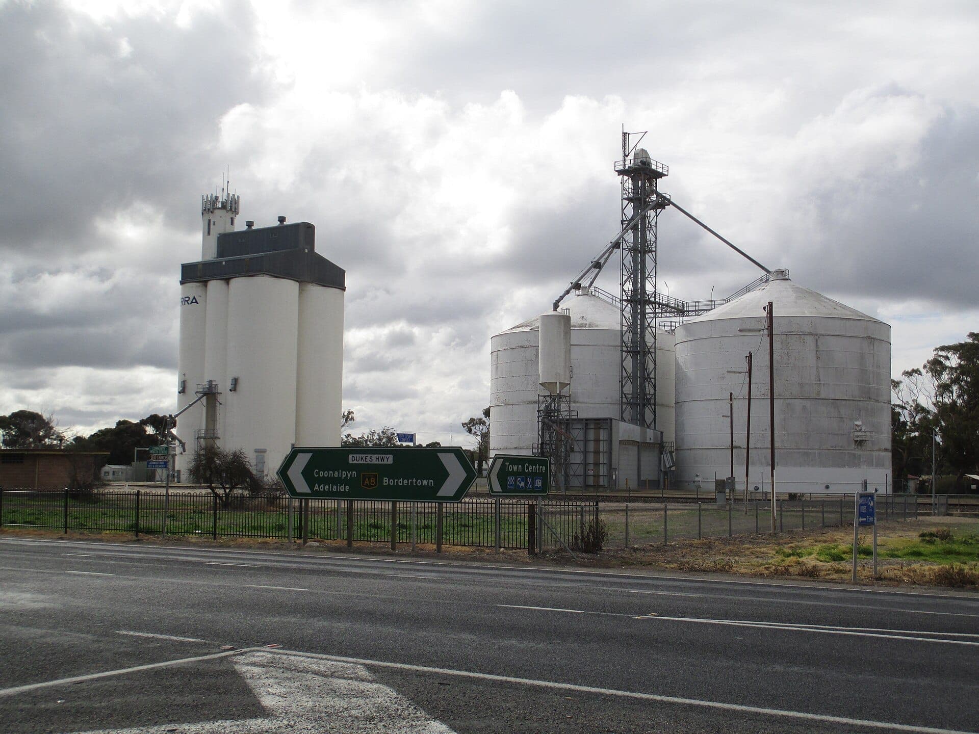 Grain silos beside a country highway in South Australia.